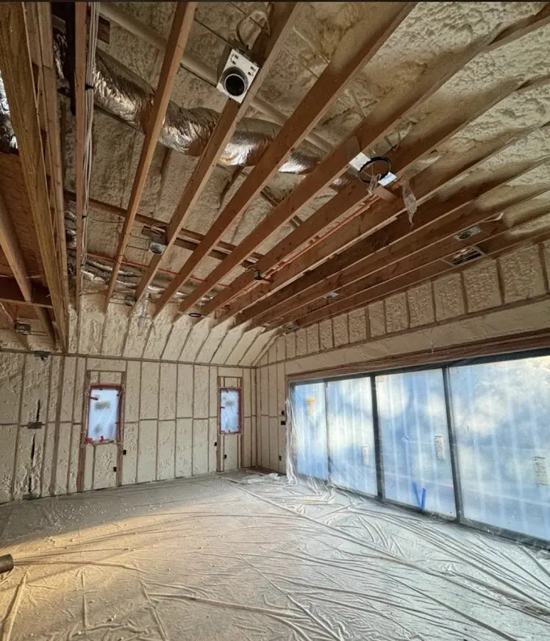 Interior walls and ceiling insulated with spray foam during new construction in Rainbow Springs